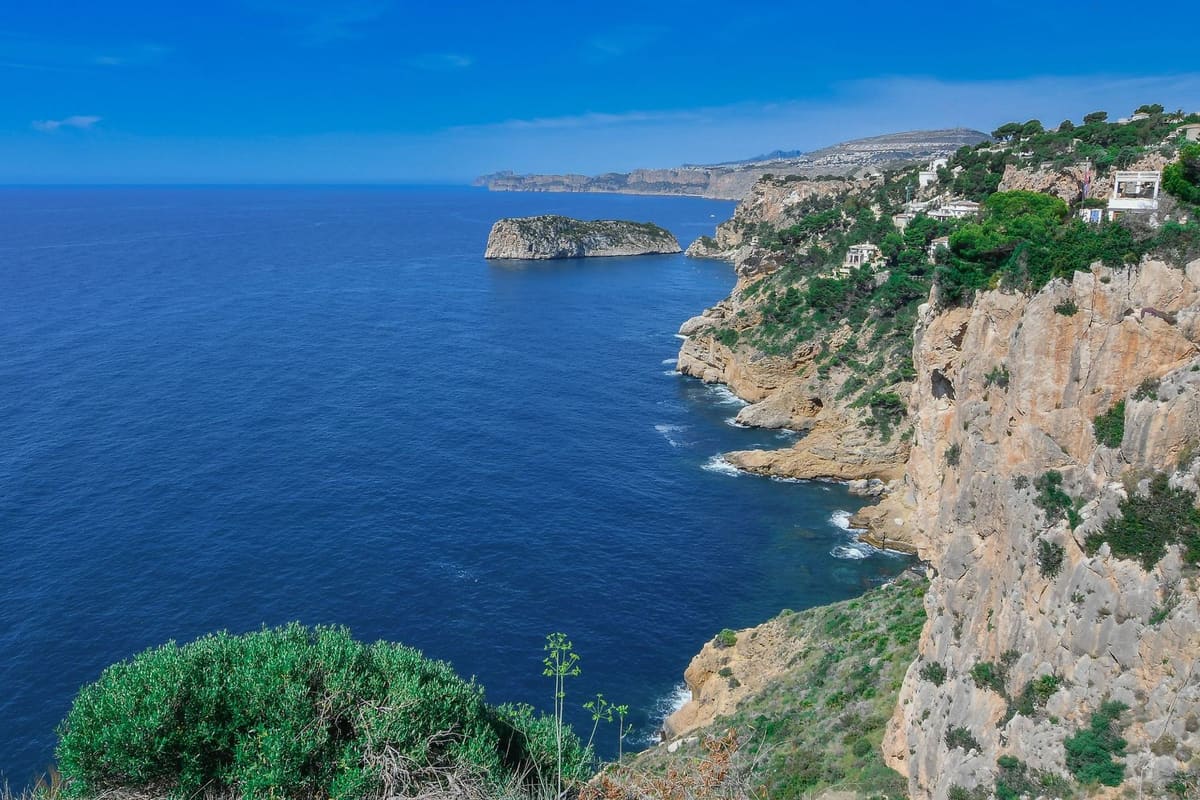 The cliffs and blue sea of the Jávea coast